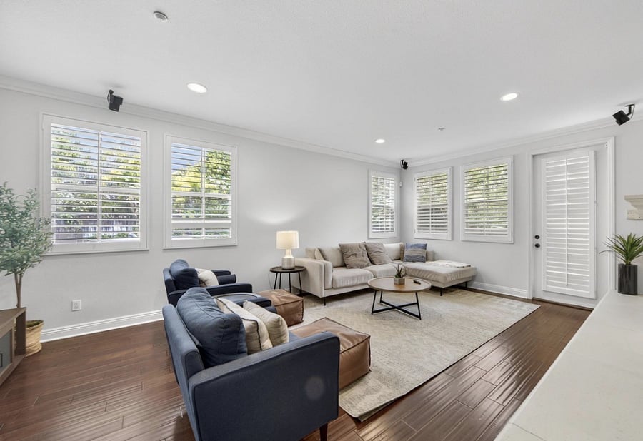 The living room offers comfortable seating and Smart TV, creating a cozy and inviting space for relaxation. 