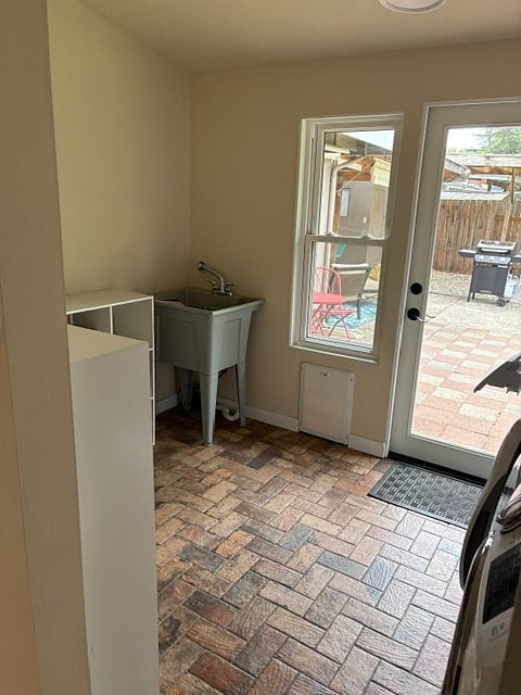 Laundry Room with Exterior Exit to the back yard