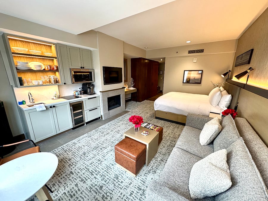 It's all here!...fully stocked kitchenette, fireplace, Smart TV (cable & personal streaming services), and if you must...a dedicated laptop friendly work desk.