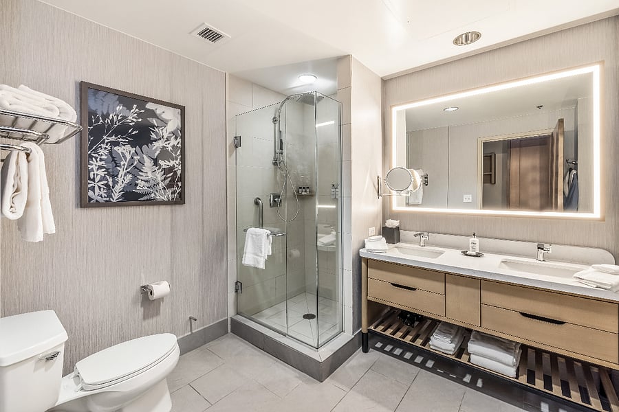 Spa style bathroom with shower, vanity and soaking tub.