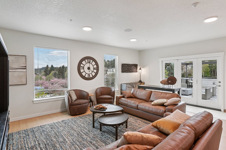 Community lounge with oversize, leather furniture and TV. You can use your own Firestick/Roku on the TV. Reservable space for gatherings.