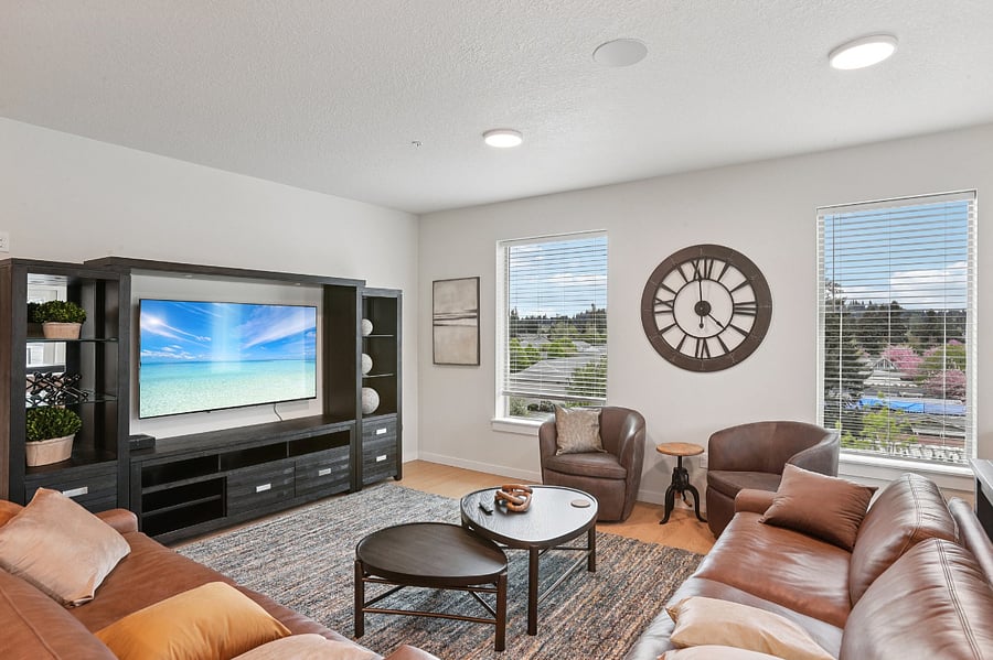 Community lounge with oversize, leather furniture and TV. You can use your own Firestick/Roku on the TV. Reservable space for gatherings.