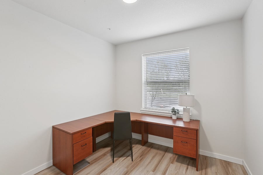 Secondary bedroom. Can be furnished as an office or additional bedroom with dresser and full size bed.