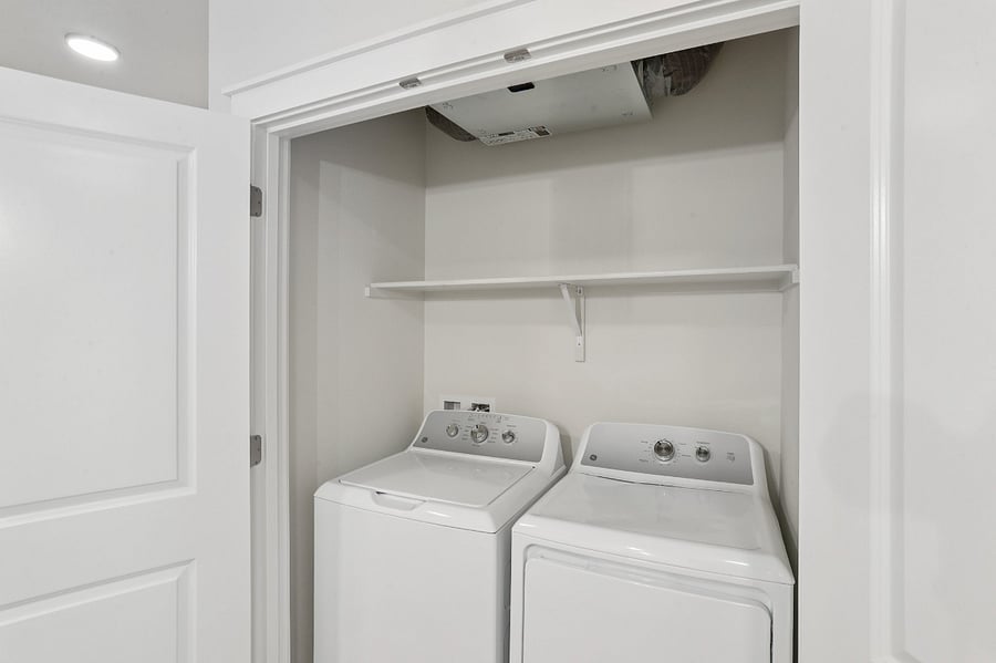 Included full size washer and dryer off of entry/kitchen.