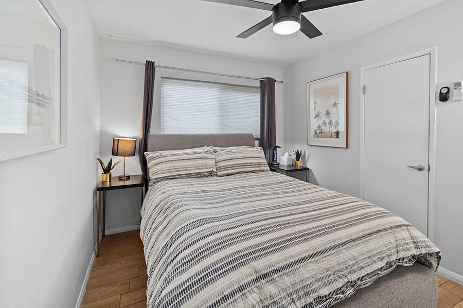 Bedroom 1 with walk-in closet and charging stations