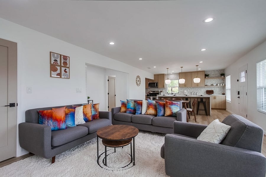 Comfortable living room designed for relaxation, featuring a bright open layout and cozy seating for movie nights or quiet evenings
