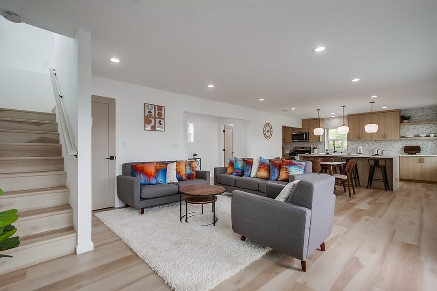 Comfortable living room designed for relaxation, featuring a bright open layout and cozy seating for movie nights or quiet evenings