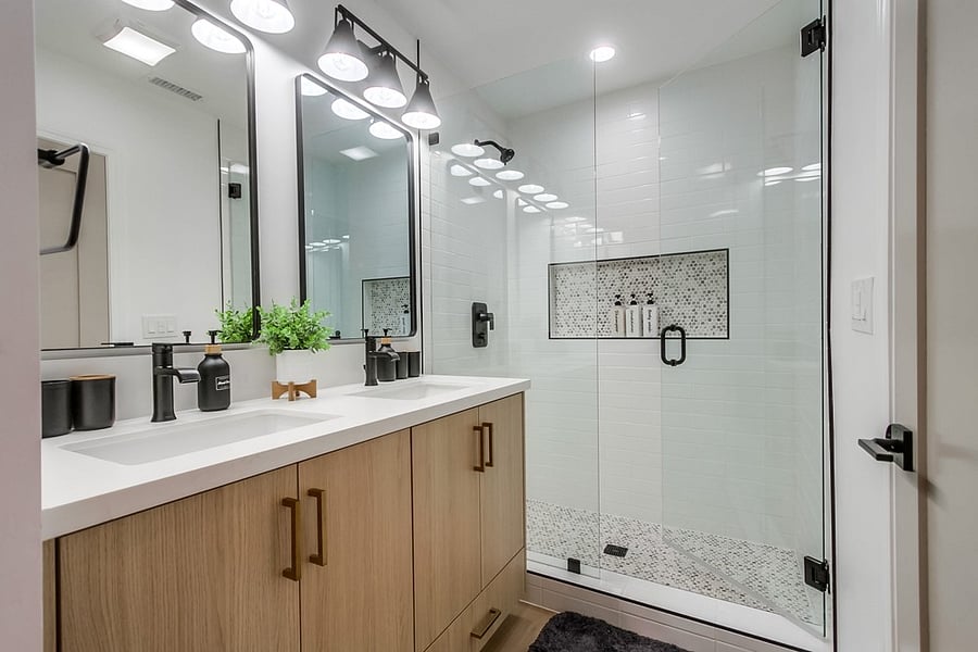 Private primary bathroom with a clean modern design, spacious vanity, and everything needed for a comfortable daily routine.
