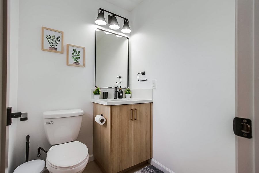 Convenient downstairs half bath perfect for guests and everyday living