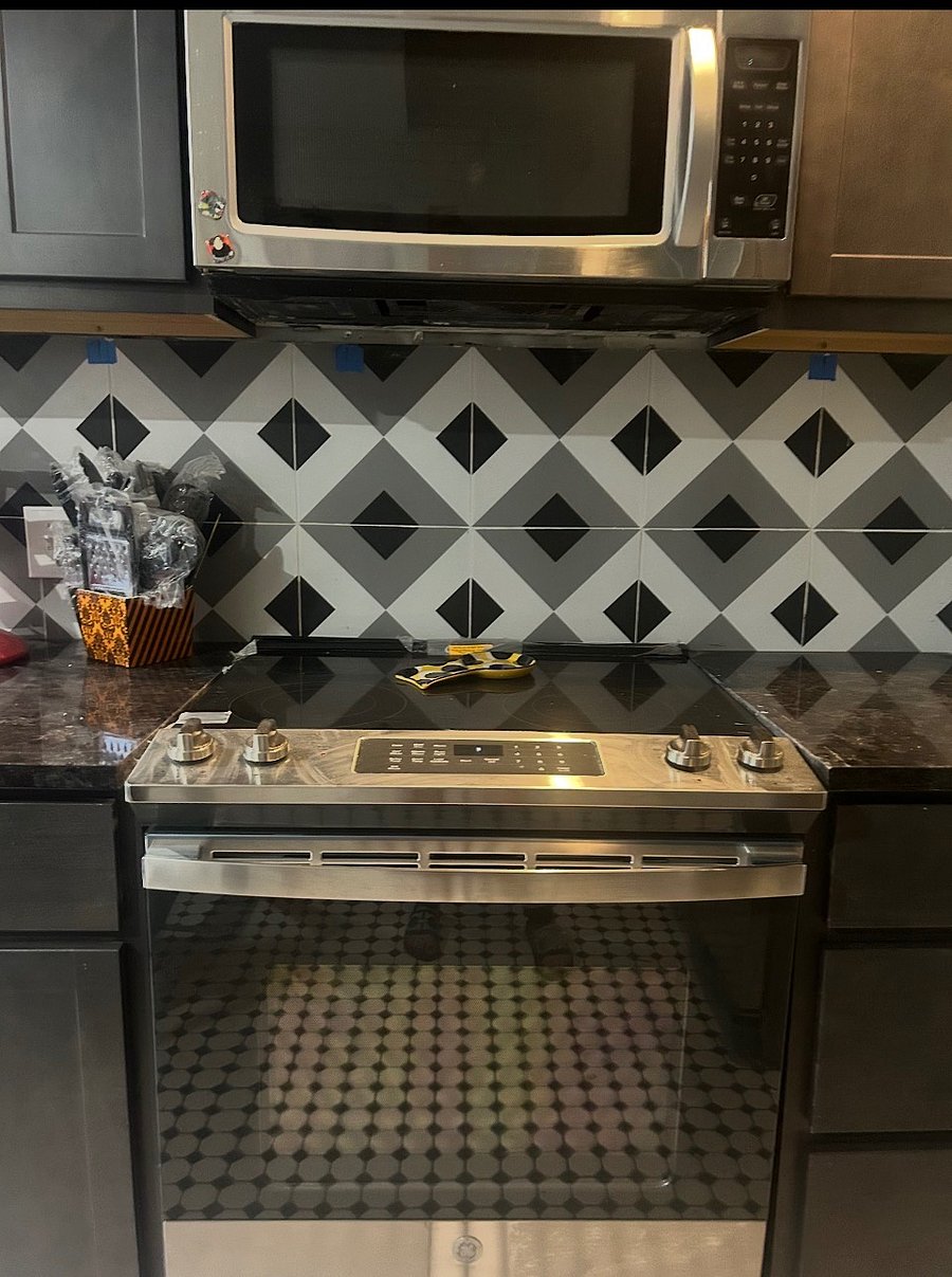 All stainless kitchen, Bosch dishwasher, brand new stainless and glass top stove, all marble countertops.