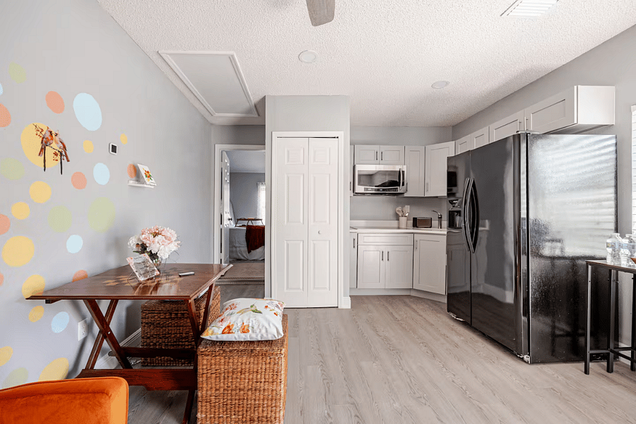 Kitchen with refrigerator, convection microwave with an induction cooktop
