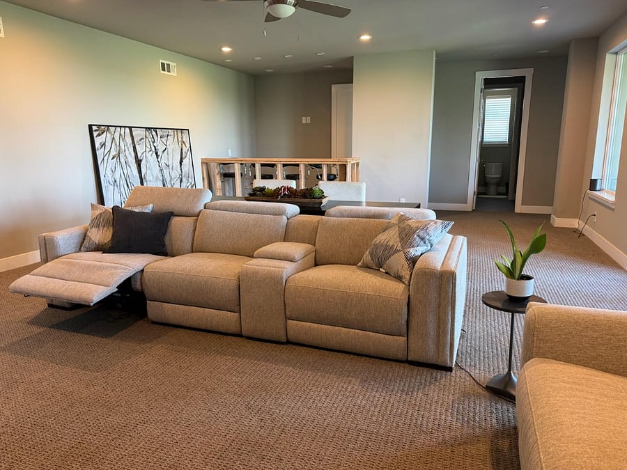 Sofa has the option to recline. Bar area (with mini fridge & sink) is in process.