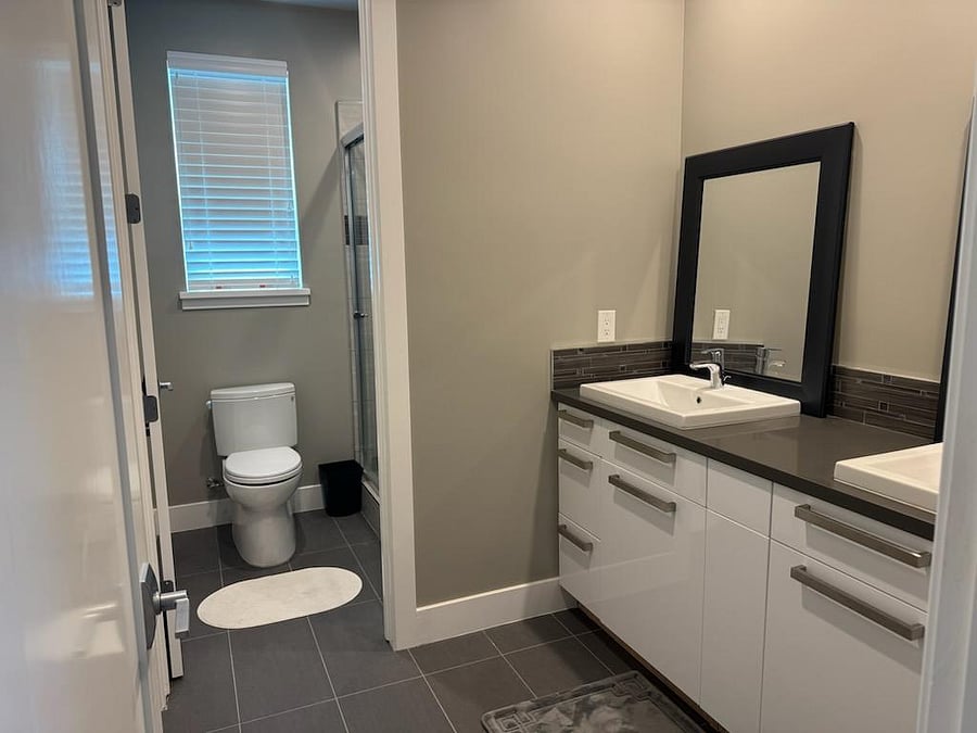 Private bath with double-vanity and shower
