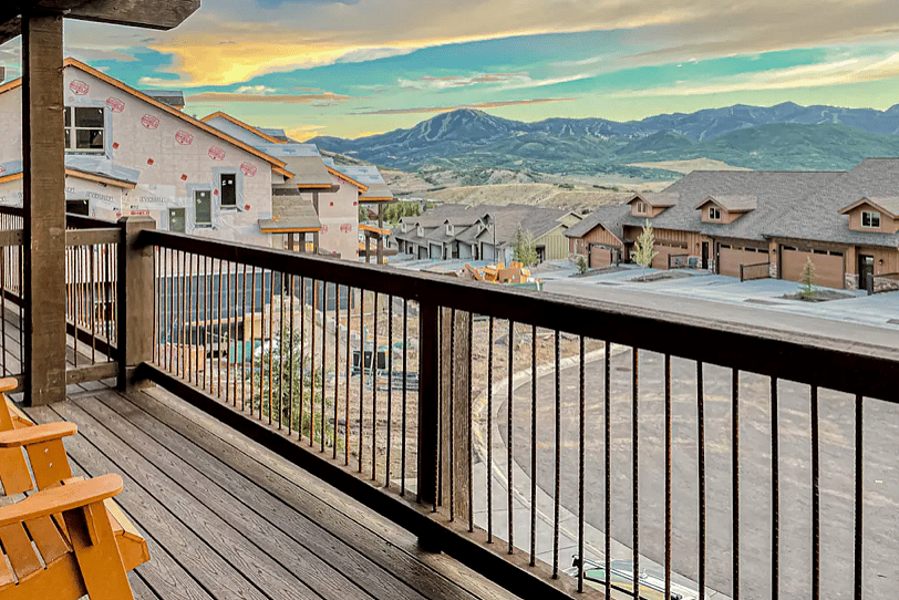 Relax on the deck while taking in the serene mountain views.