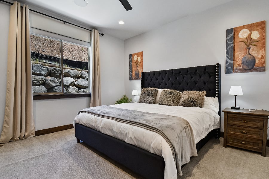 Master Suite 2 with a comfortable king bed, TV with ensuite bath - Middle/Main Floor