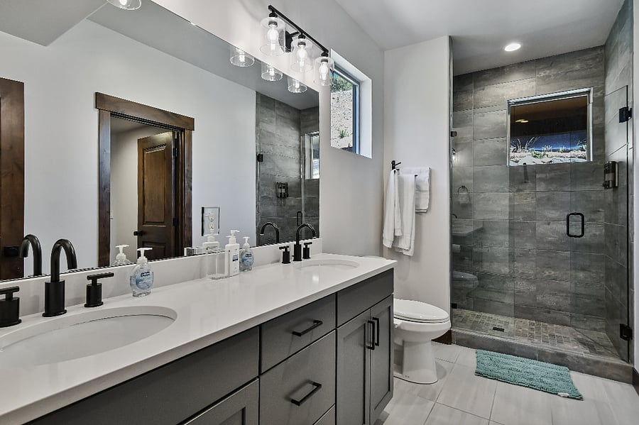 Bath 3: with dual sinks and spacious shower, ensuite bath to bedroom 4