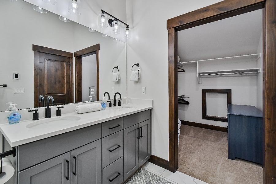 Bath 2: Dual sinks, steam shower, walk-in closet, ensuite bath to master suite 1
