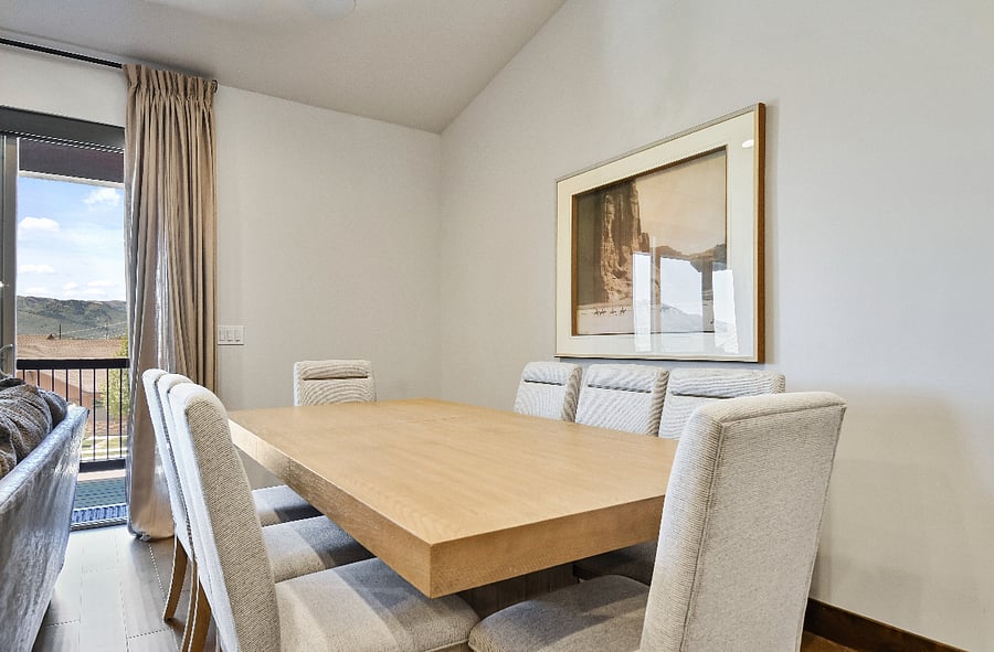 Dining area with views of mountains and seating for 6 to 8 people