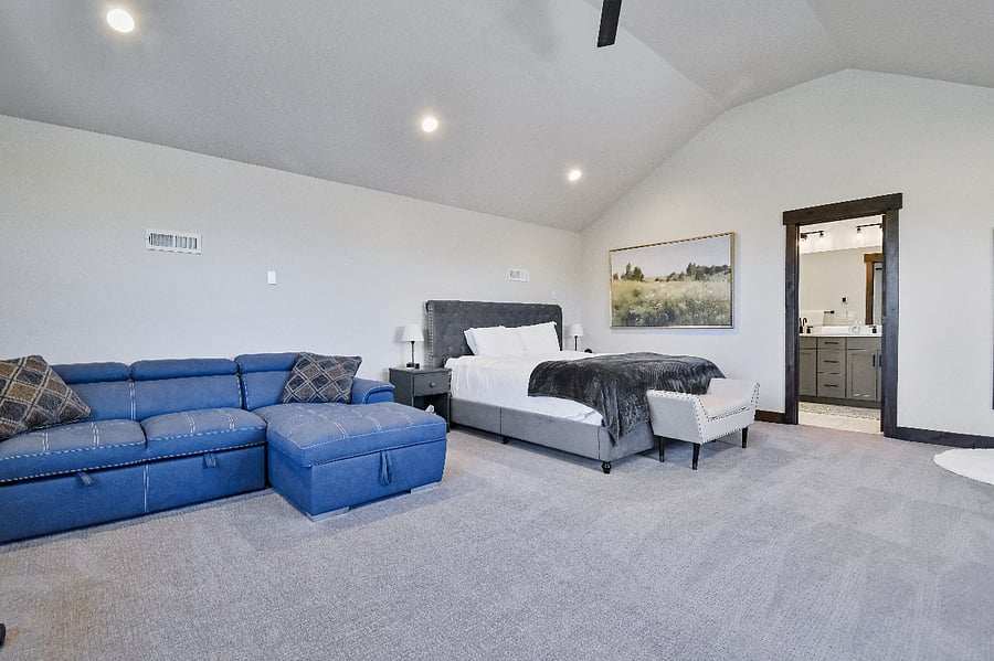 Master suite 1 with comfortable king bed, pullout Queen sofa and ensuite bath - Top Floor