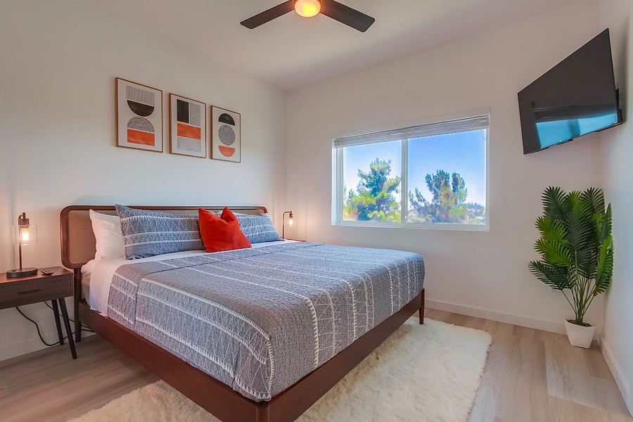 Fully Furnished, Spacious and peaceful primary suite featuring a comfortable bed, natural light, ample storage, and a relaxing atmosphere designed for extended stays.