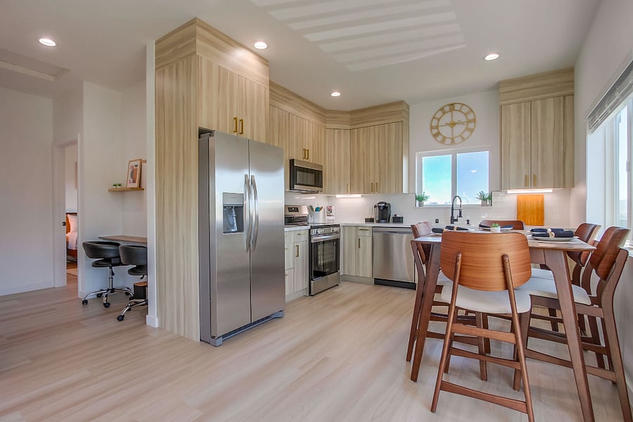 Fully equipped kitchen with modern appliances, generous counter space, and all the essentials needed to cook and feel at home.