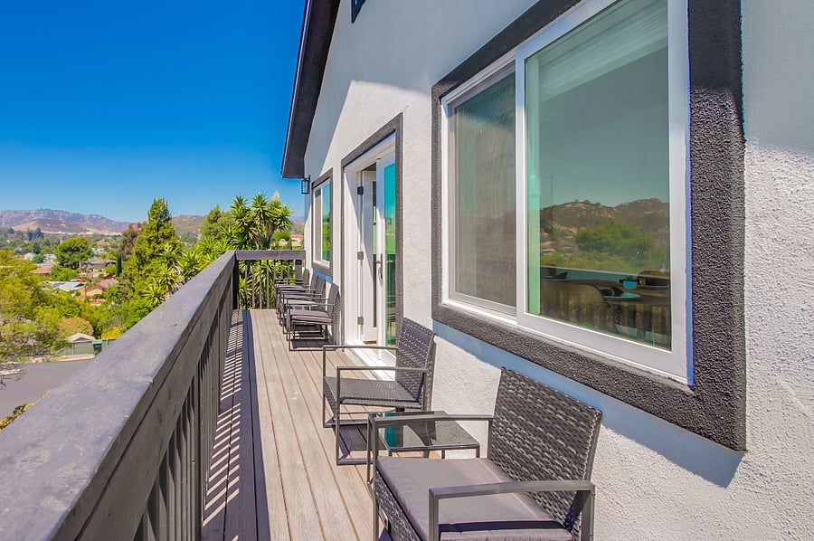 Private outdoor deck with sweeping hilltop views and peaceful surroundings the perfect place to enjoy your morning coffee, unwind after a long day, or take in beautiful Southern California sunsets.