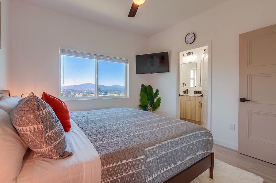 Fully Furnished, Spacious and peaceful primary suite featuring a comfortable King size bed, natural light, ample storage, and a relaxing atmosphere designed for extended stays.