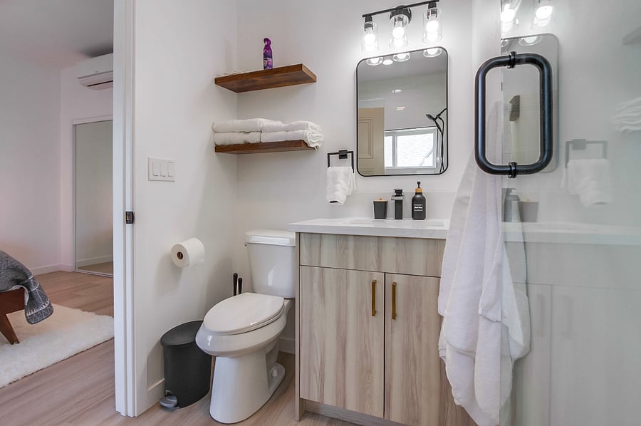 Fresh and updated full bathroom conveniently in the second bedroom for added comfort and privacy