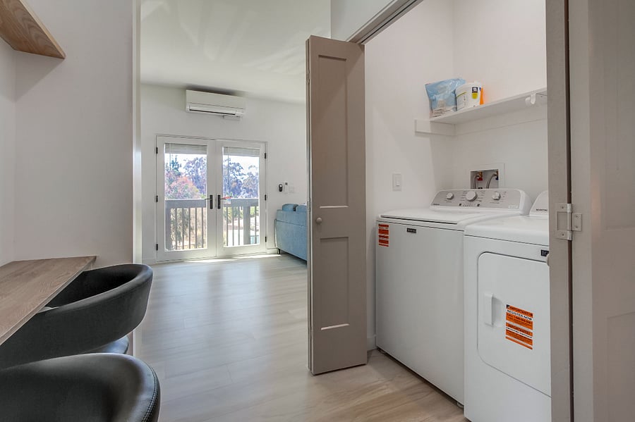 In-unit laundry with washer and dryer included, making extended stays simple and convenient