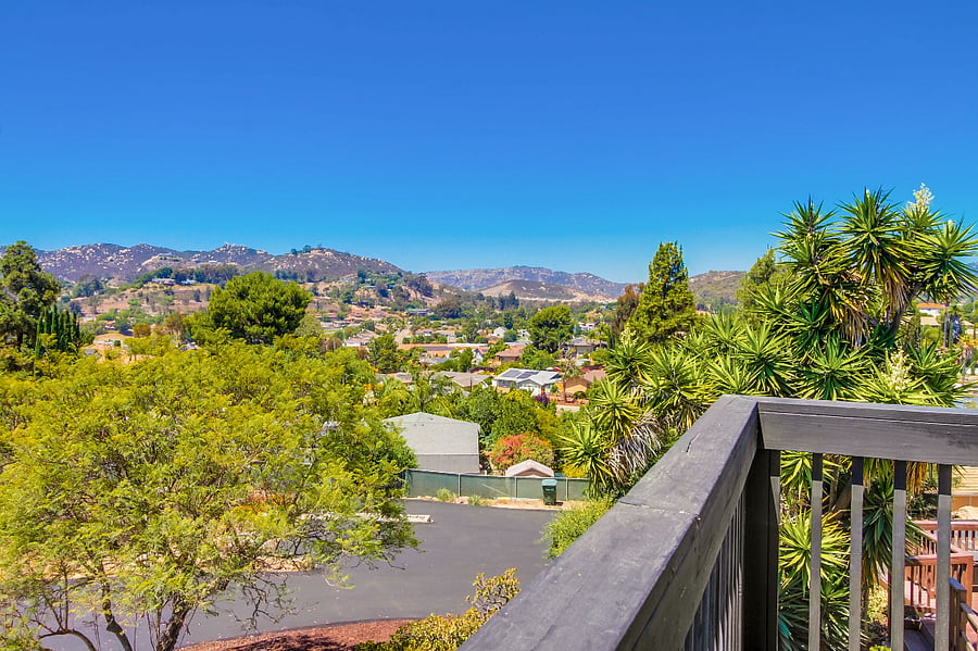 Private outdoor deck with sweeping hilltop views and peaceful surroundings the perfect place to enjoy your morning coffee, unwind after a long day, or take in beautiful Southern California sunsets.