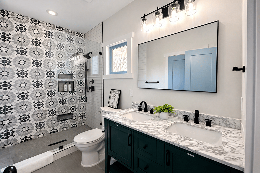 Located off The Beltline Suite (upstairs primary bedroom), this spa-inspired bath is pure luxury. Enjoy double sinks, walk-in shower, plush linens, designer interiors, and premium Apotheke products for a true boutique hotel experience.