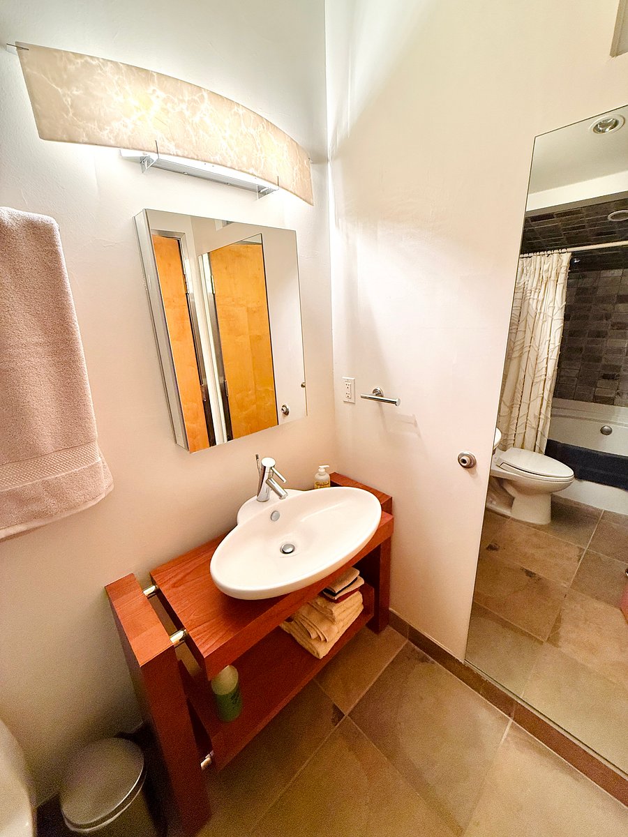 Full-length mirror in the upstairs bathroom