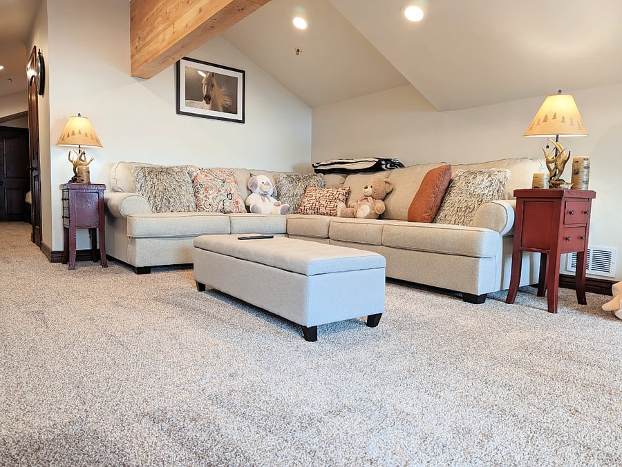 There is a large upstairs den area with it's own living area, smart tv, refrigerator and to 2 twin beds with 2 more twin trundles beds.
