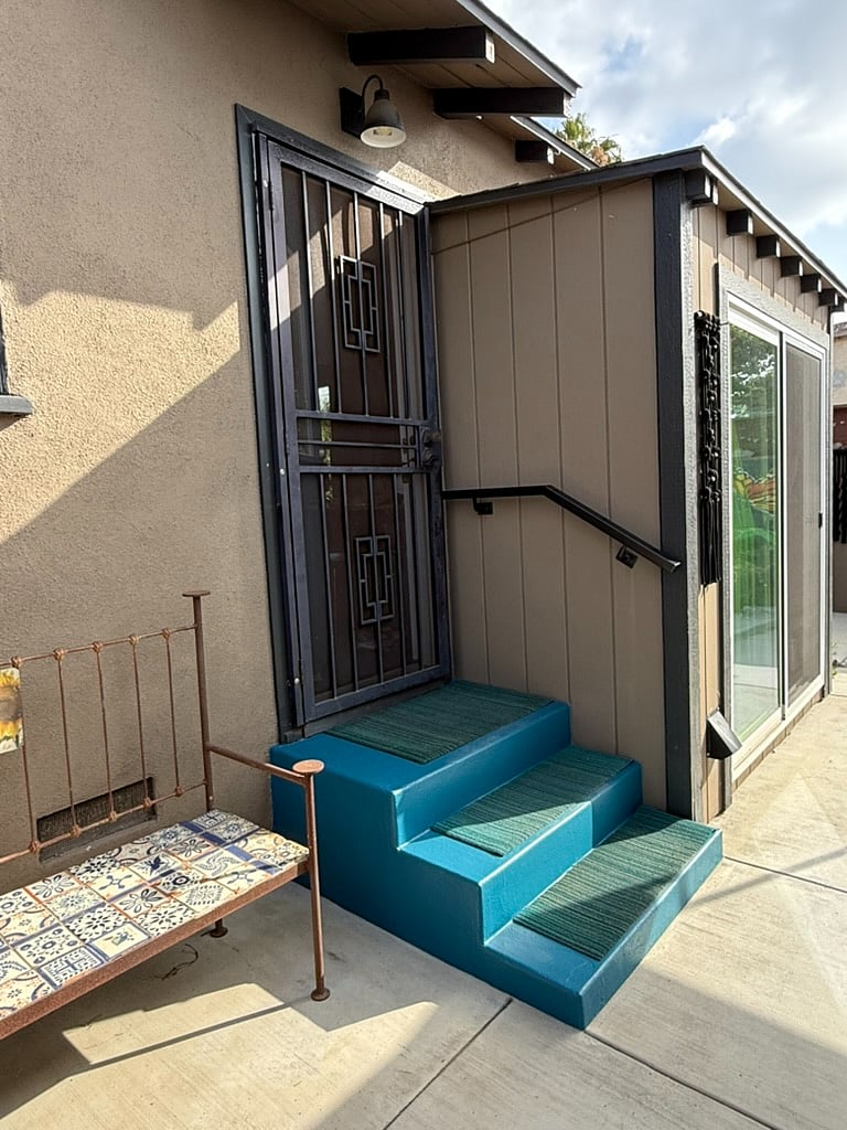 Backdoor / Main entrance and Laundry Room.