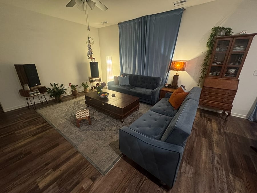 Living room with bluetooth speakers for easy listening.