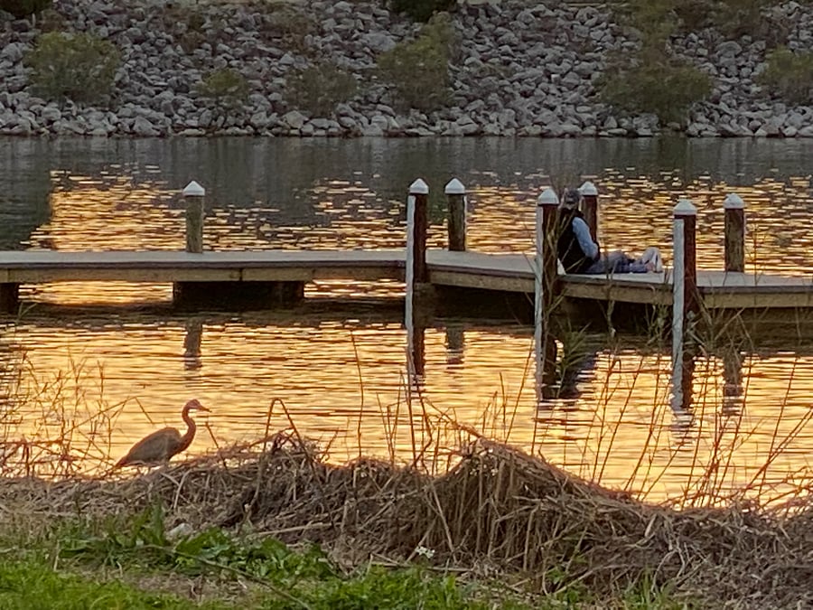 Boat ramp w/places to toss a line in.