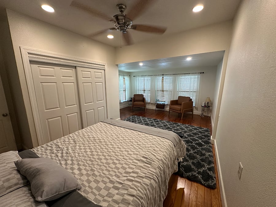 Master bedroom with seating area