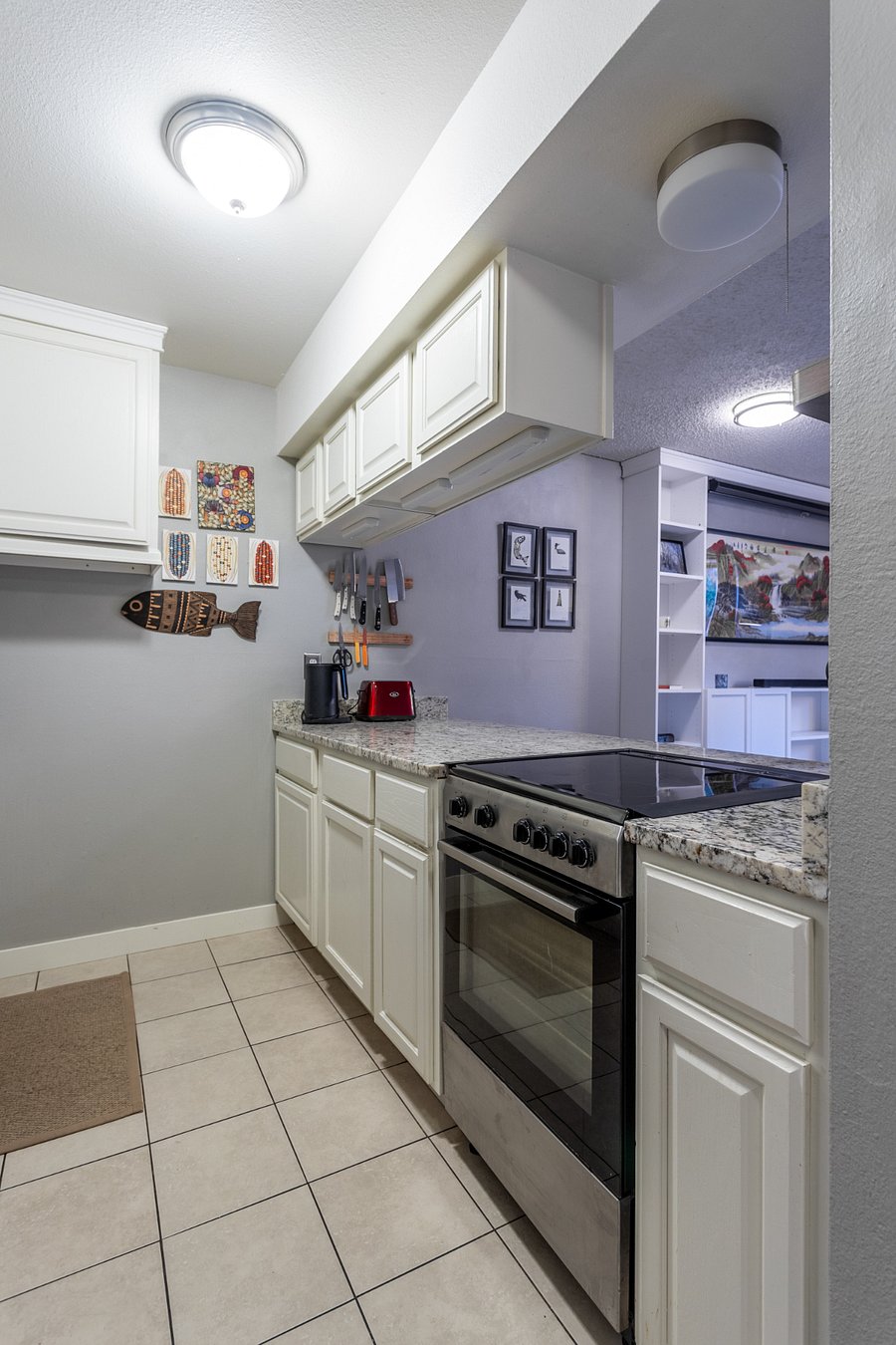 Full size oven and easy clean electric stove top.