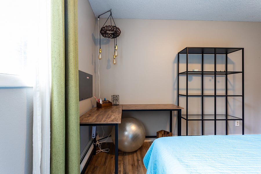 L shaped desk for private work in the master bedroom.