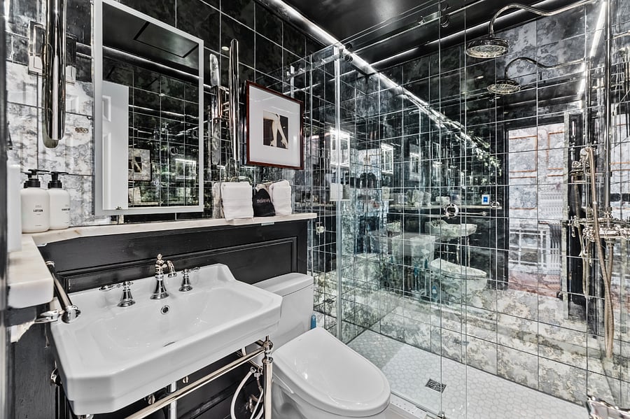 Antique Mirror Tile Bathroom. Treated to not be completely reflective.
