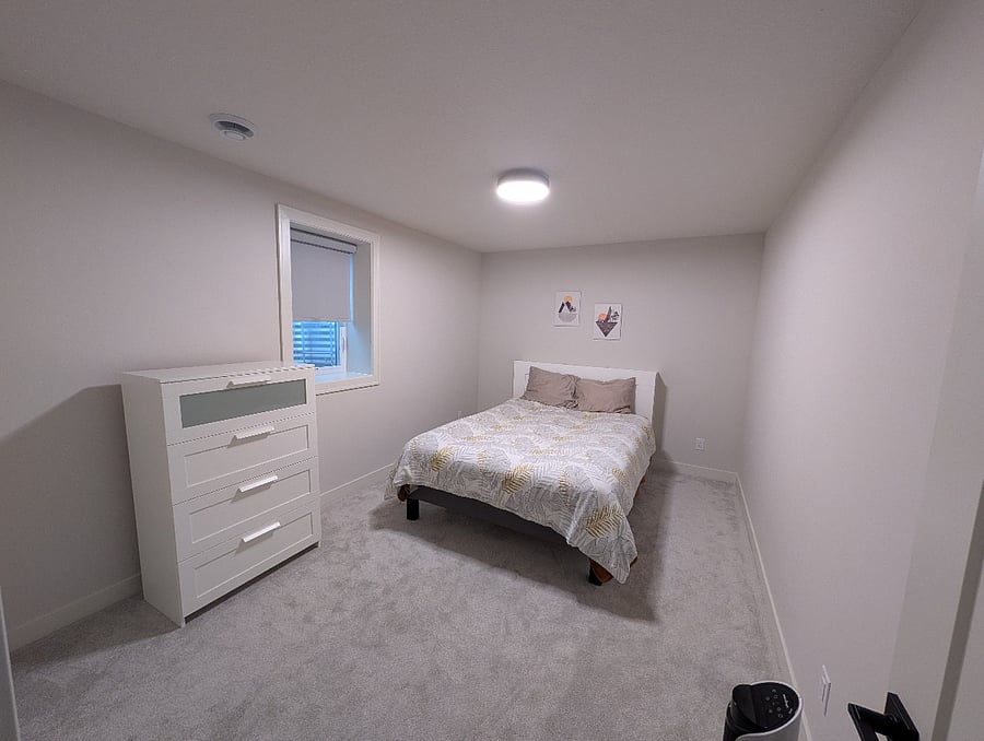 Third bedroom with queen bed and large closet (finished basement)
