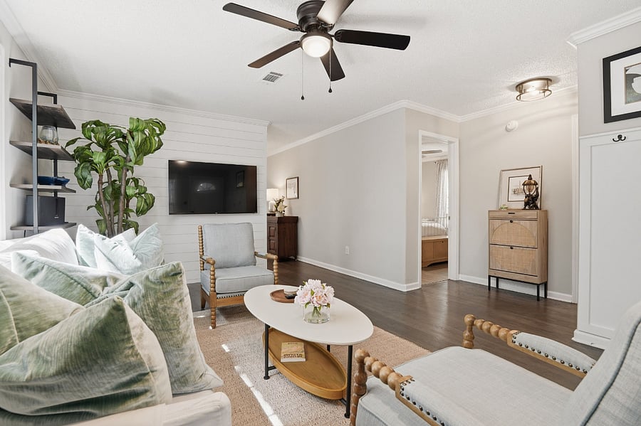 Living room with view to the hallway leading to 2nd and 3rd bedrooms and 2nd full bathroom. 