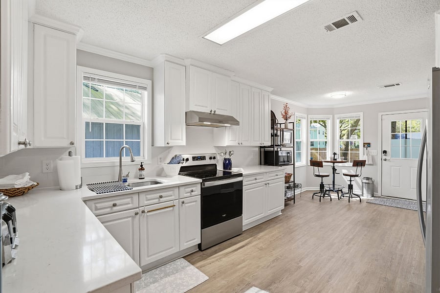 Kitchen with bistro table for enjoying morning coffee.