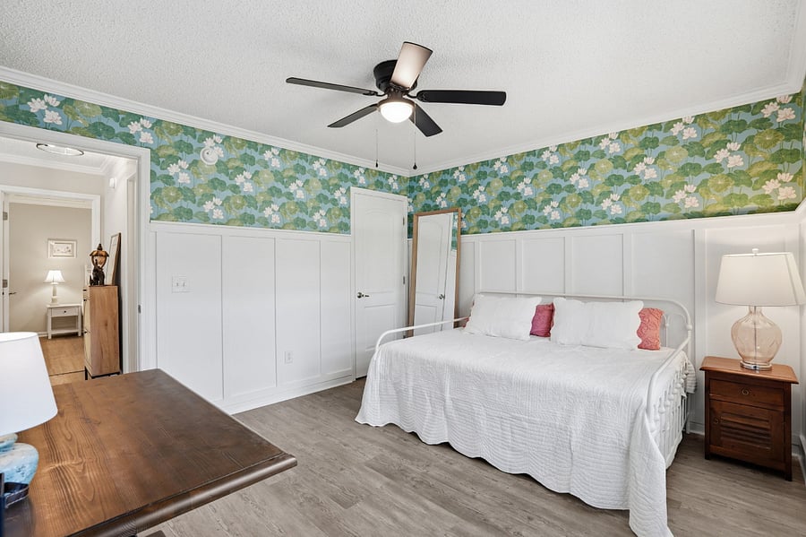 3rd Bedroom with trundle bed (full on top, twin on bottom), dedicated work space with standing desk, and closet.
