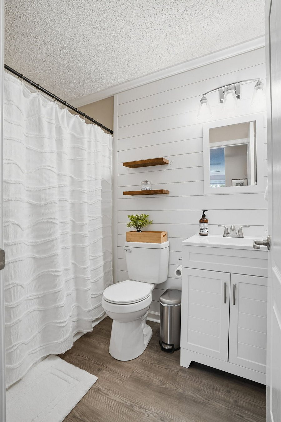 Full bathroom with shower/tub.