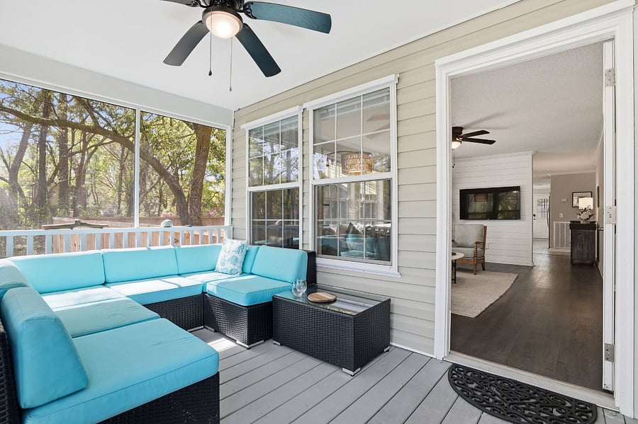 Screened-in front porch with large sectional for lazy days or working from home while listening to song birds.