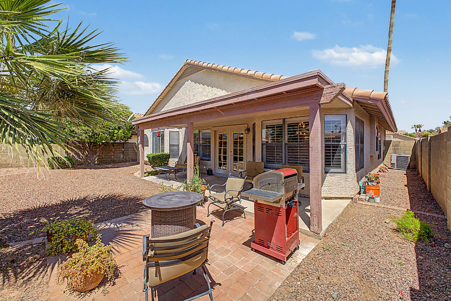 Patio area with bbq grill and fire pit