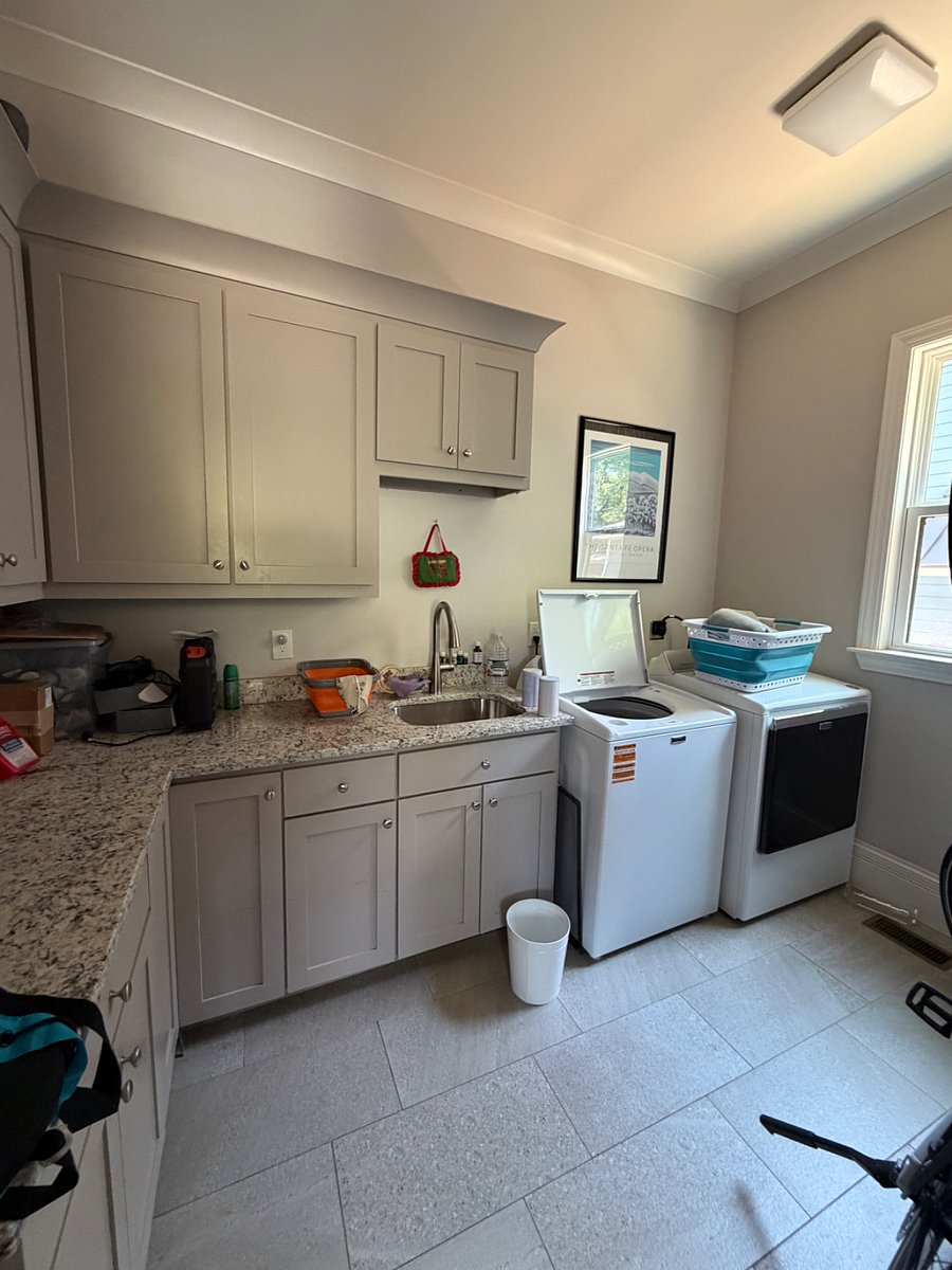 Laundry room with utility sink. Our 2 electric bicycles will be stored here (and one road bike). You can use them if desired.