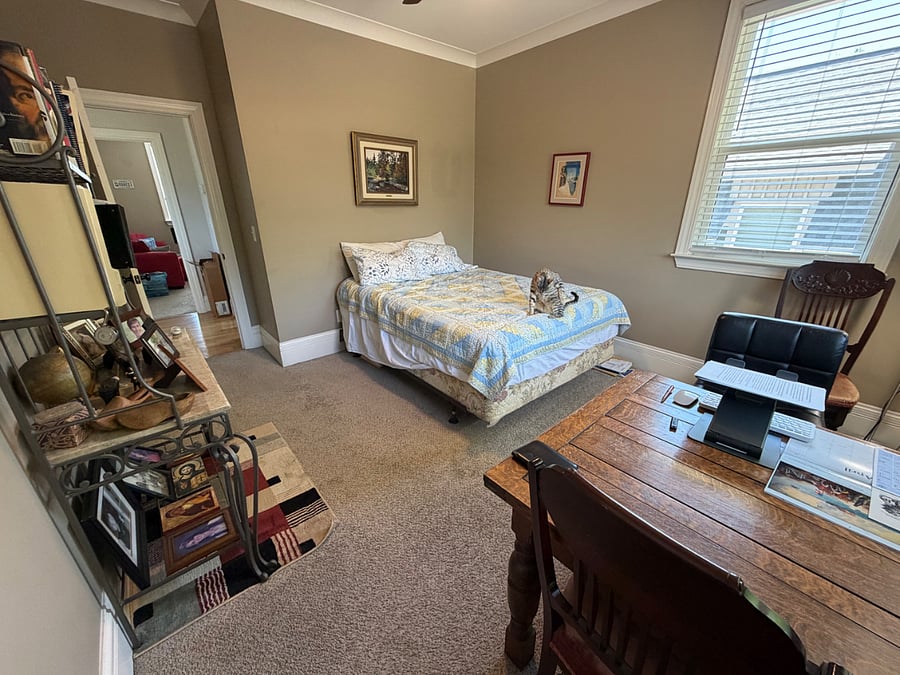 Upstairs bedroom with hall bath looking from the closet door