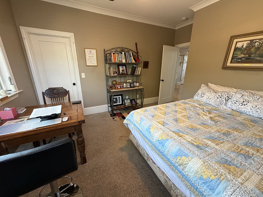Upstairs bedroom with queen bed, and hall bath, looking out toward. the door
